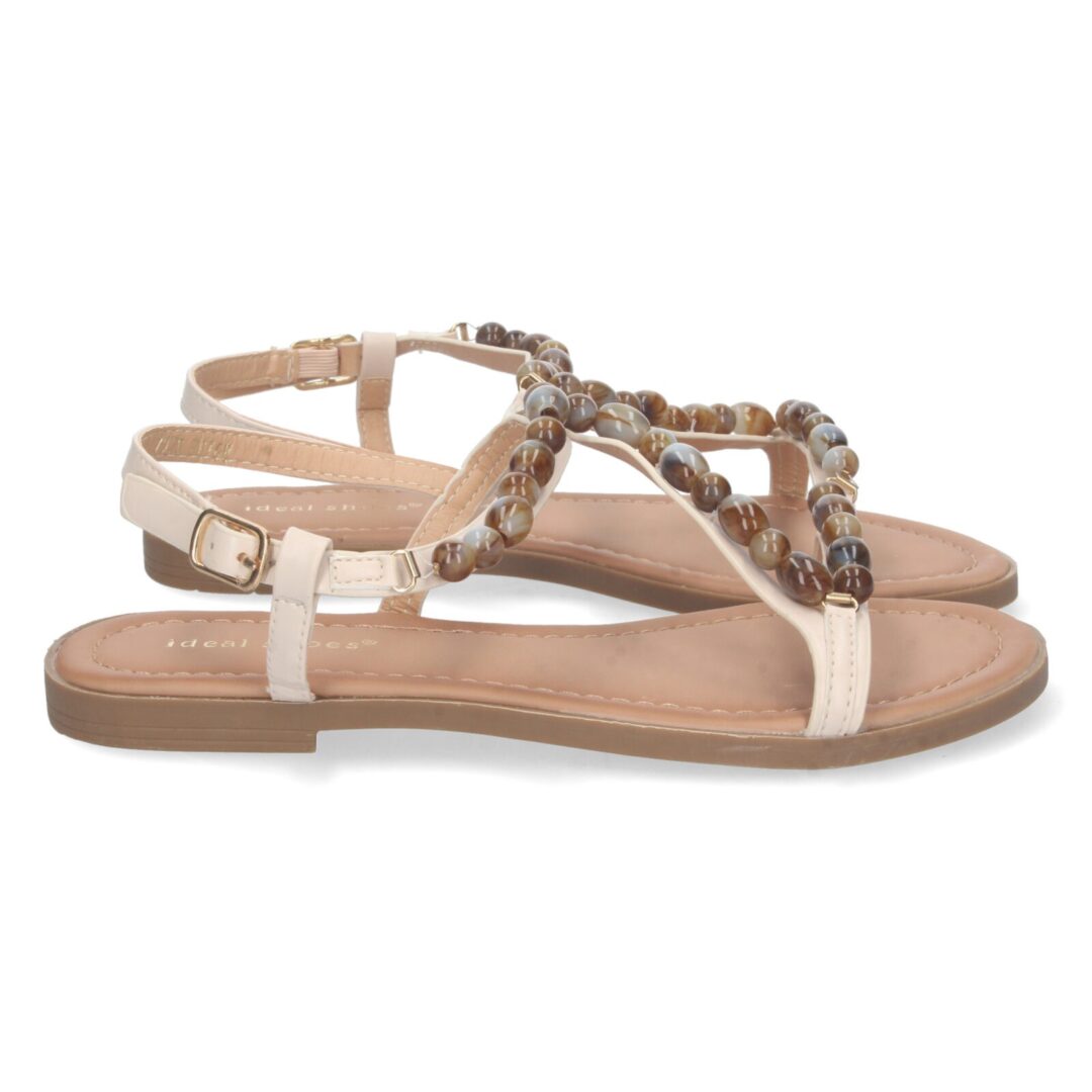 Sandalias planas con abalorios beige