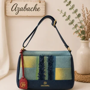 Bolso bandolera de tela con triple compartimento