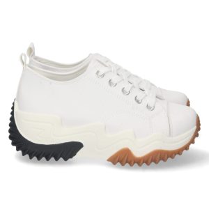 Zapatilla deportiva blanca suela gruesa